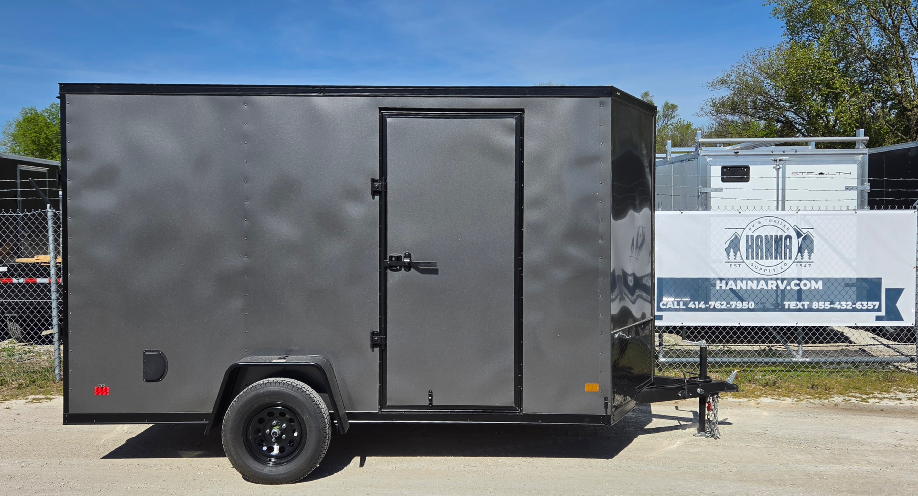 DarkHorse 6.5X12 Wedge Nose Single Axle Steel Cargo Trailer with Ramp Door, 12" Extra Height - 2500 Series - Charcoal with Blackout Package